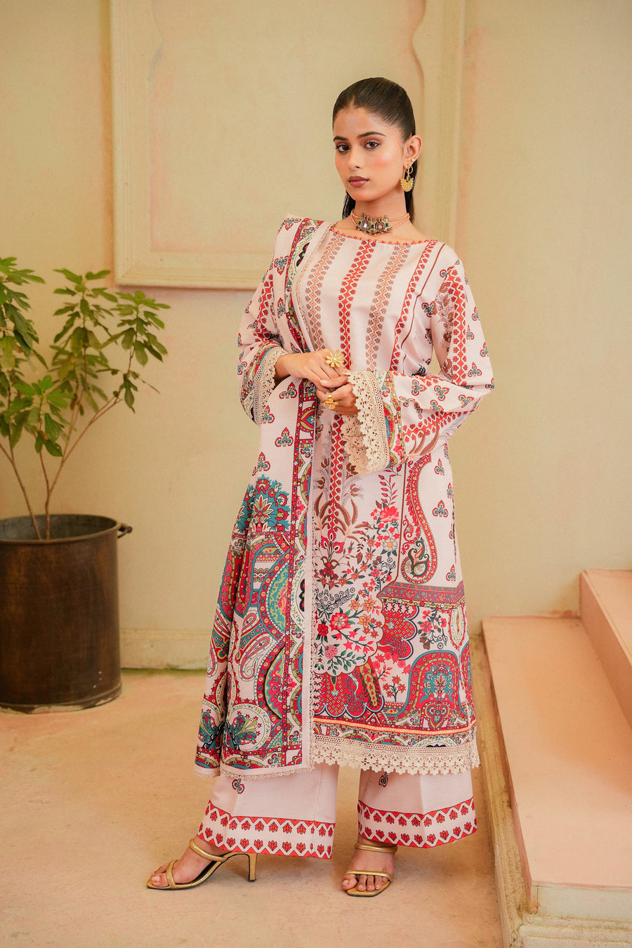 Ambi pink printed khaddar 3 piece suit, front view